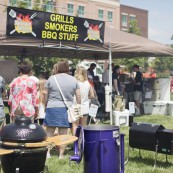 Folks enjoying the popular outdoor barbeque portion of the NFOB