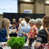 RaChelle Hubsmith visits with festival attendees.